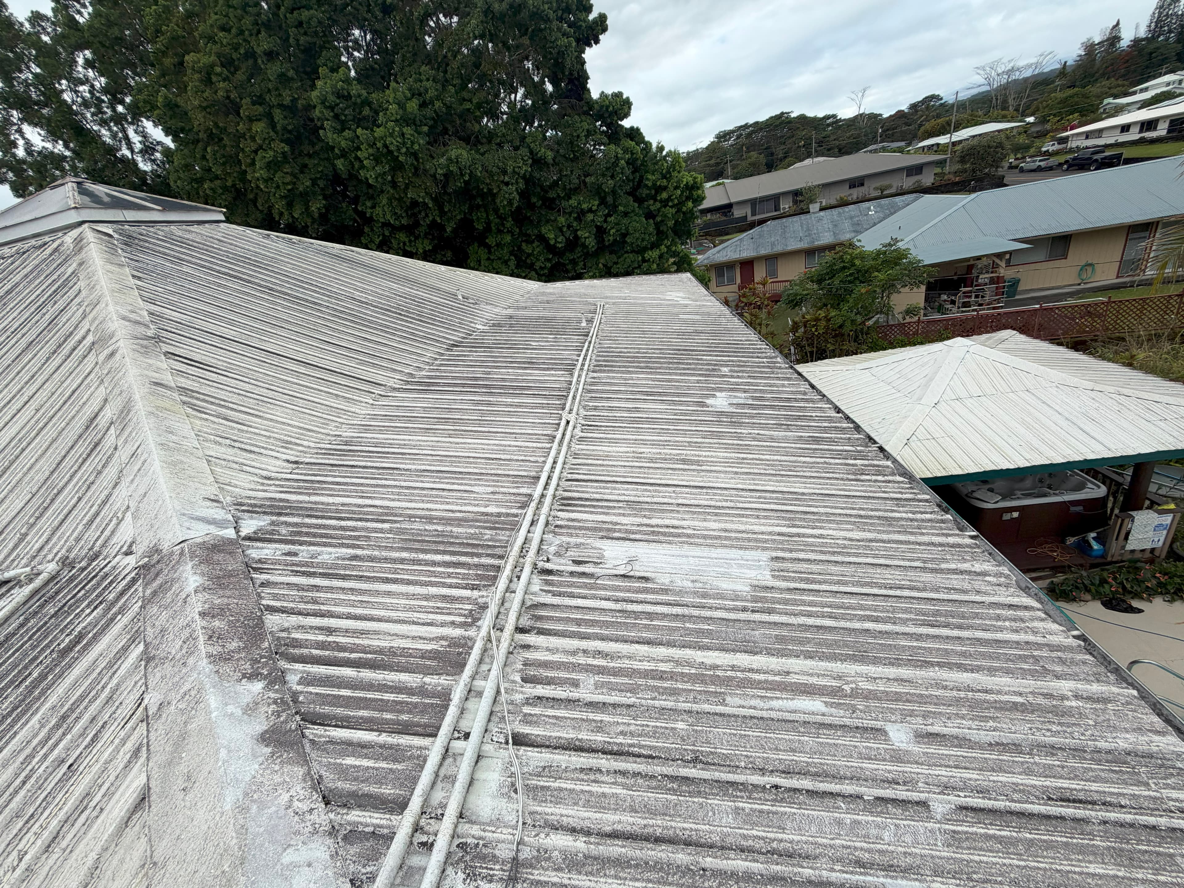 Roof before soft washing on Big Island Hawaii